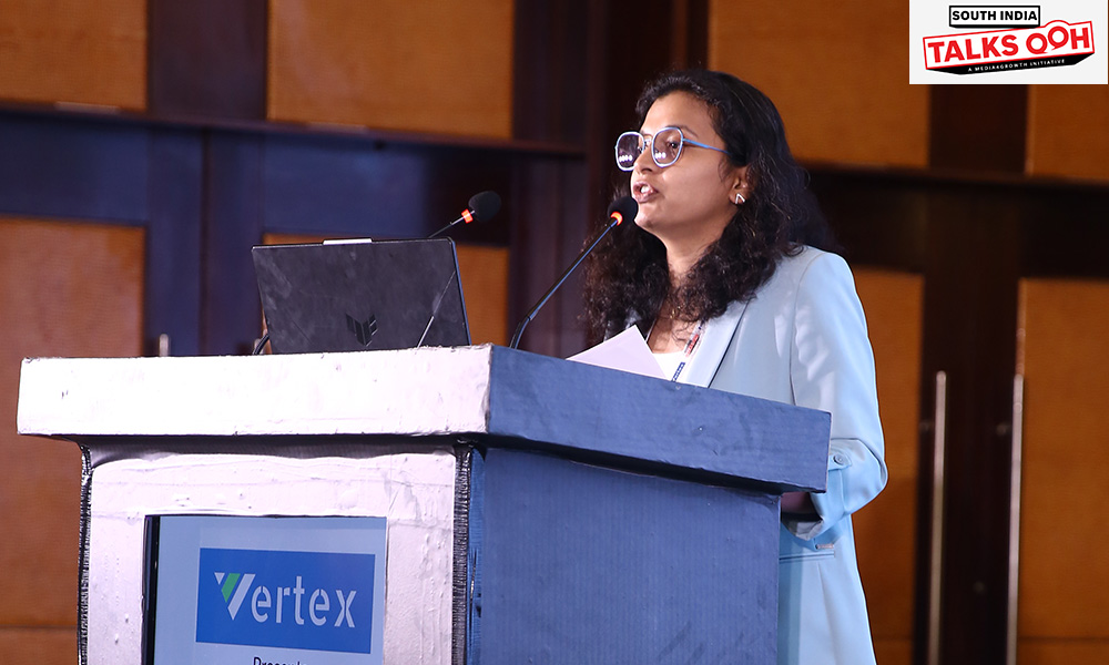 Garima Dubey presenting at South India Talks OOH